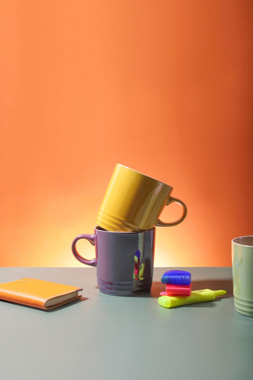 Branded corporate gifts including mugs, notebooks and pens